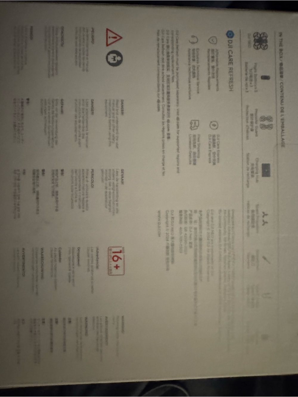 DJI Mini Drone Packaging - White and Red Accents comes with land options as well - Picture 3 of 5